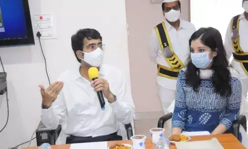 Collector D M Reddy addressing VROs in Rajanagaram on Tuesday. Sub-Collector Anupama Anjali is also seen