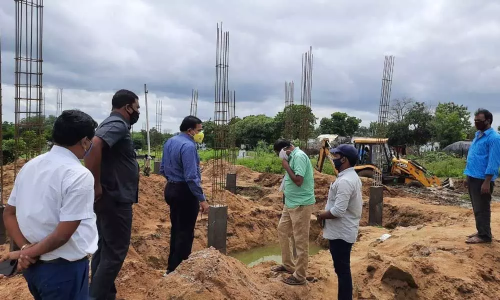 District Collector Sharman Chavan inspecting development works in Aler village on Wednesday