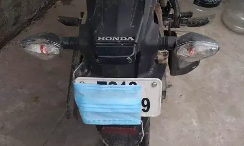 Hyderabad: Youngster uses face mask to cover his bike number plate