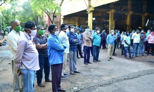 Coal mine workers attending a gate meeting at RG-1 of SCCL in Ramagundam on Wednesday