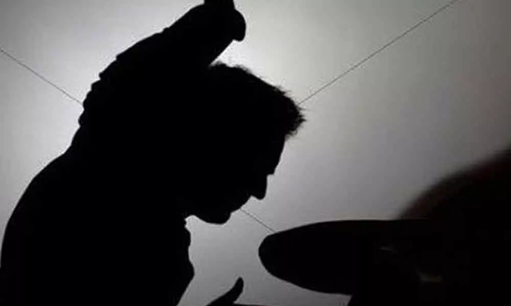 Drunk man thrashes daughter, spits on her face in Vikarabad, held