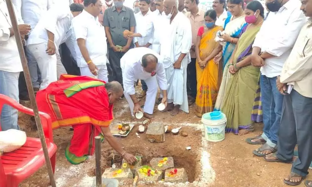 MLA B Krishna Mohan Reddy participating in land breaking ceremony for the construction of park in Gadwal on Thursday
