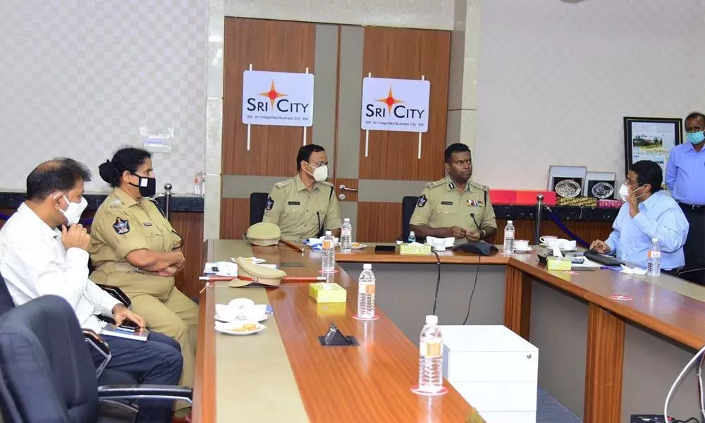 Additional DGP(Law & Order) Dr Ravishankar Ayyanar conducting a meeting with Chittoor Superintendent of Police Senthil Kumar and Sri City MD Ravindra Sannareddy