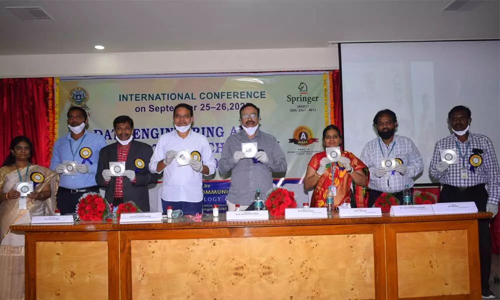 The dignitaries who attended Springer International conference releasing the souvenir in Warangal on Friday