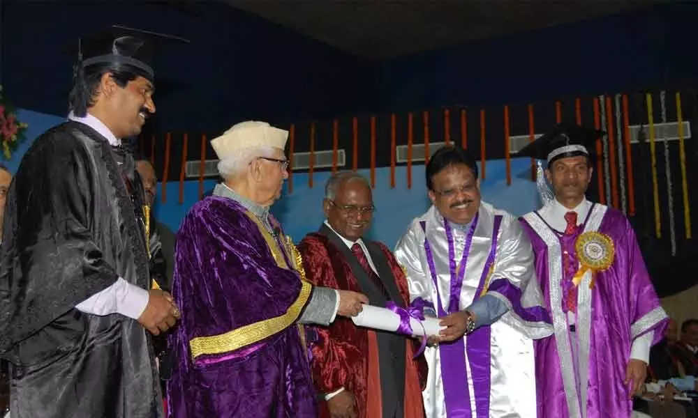 File picture of legendary singer SP Balasubrahmanyam receiving honorary doctorate at Andhra University in Visakhapatnam from the then Governor ND Tiwari
