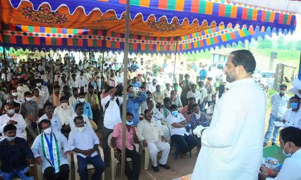 Assembly Speaker T Sitaram addressing a public meeting after the inauguration of drinking water taps