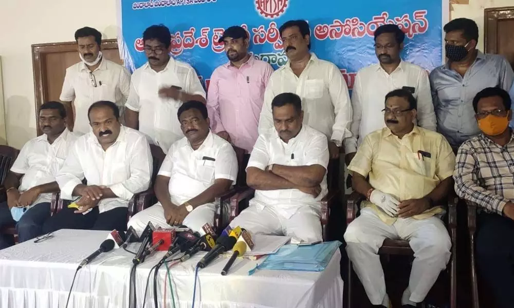 Andhra Pradesh Treasury Services Association leaders addressing the media at the APNGOs office in Vijayawada on Sunday