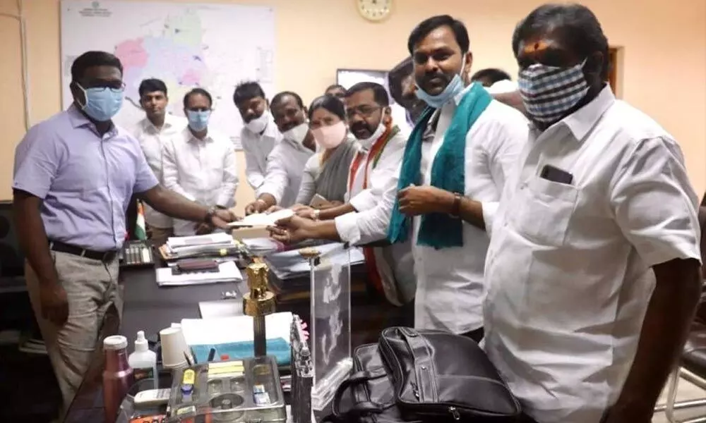 Congress leaders submitting a memorandum to the Warangal Urban District Collector Rajeev Gandhi Hanumanthu on Monday