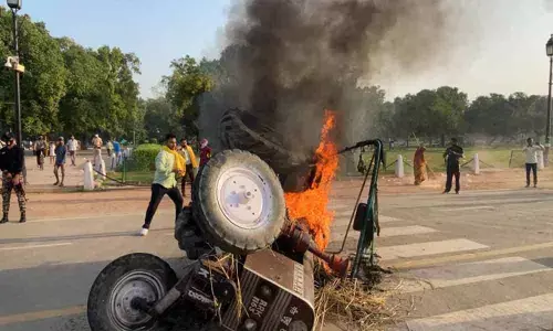 Tractor set on fire at India Gate in New Delhi to protest against farm Bills