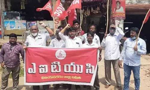 AITUC leaders staging a dharna in Vizianagaram on Monday