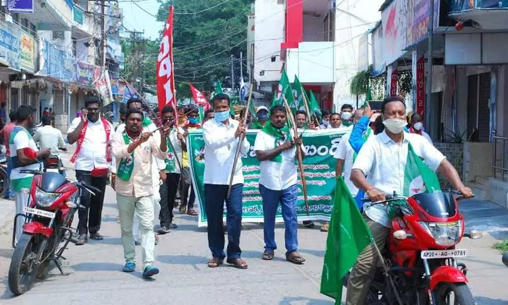 Tribal leaders taking out a rally in Bhadrachalam on Tuesday