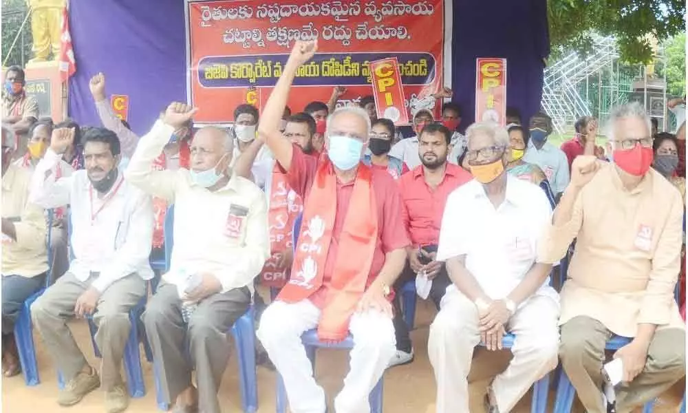 CPI national secretary K Narayana along with other leaders taking out a protest in Visakhapatnam on Tuesday