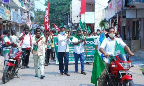 Tribal leaders taking out a rally in Bhadrachalam on Tuesday