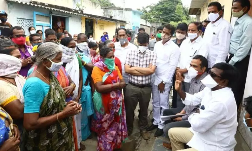 Minister for Transport Puvvada Ajay Kumar explaining about non-agricultural property survey to the people in Khammam on Wednesday
