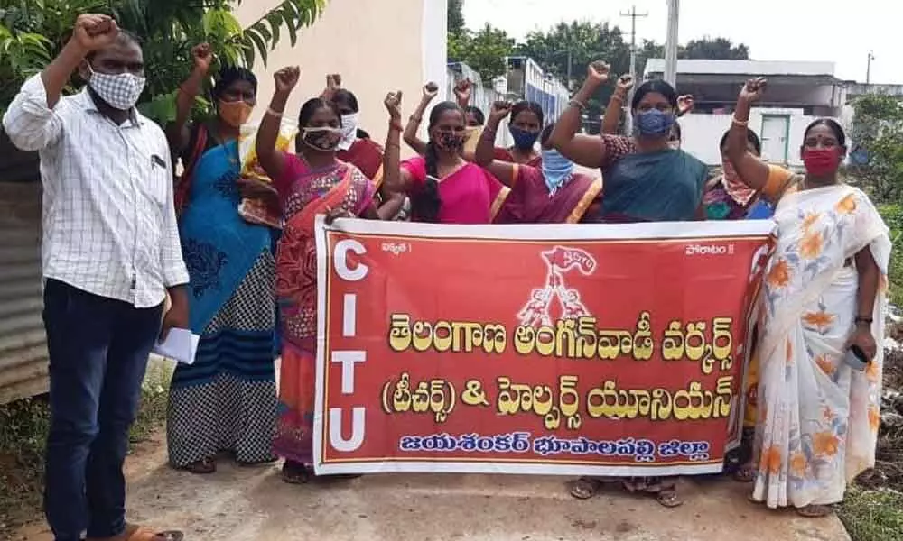 Anganwadi workers staging protest in Bhupalpally on Thursday