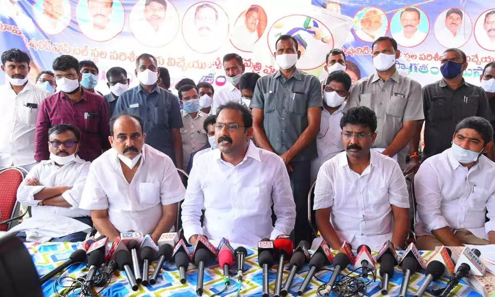 Deputy Chief Minister and Medical and Health Minister Alla Nani speaking to media after inspecting the land for super specialty hospital at Ainamukkala village on Thursday