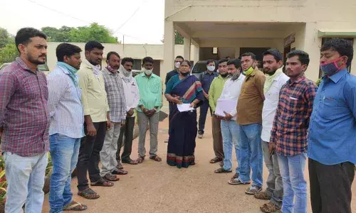 Mulugu MLA Seethakka with private teachers at Mulugu on Thursday