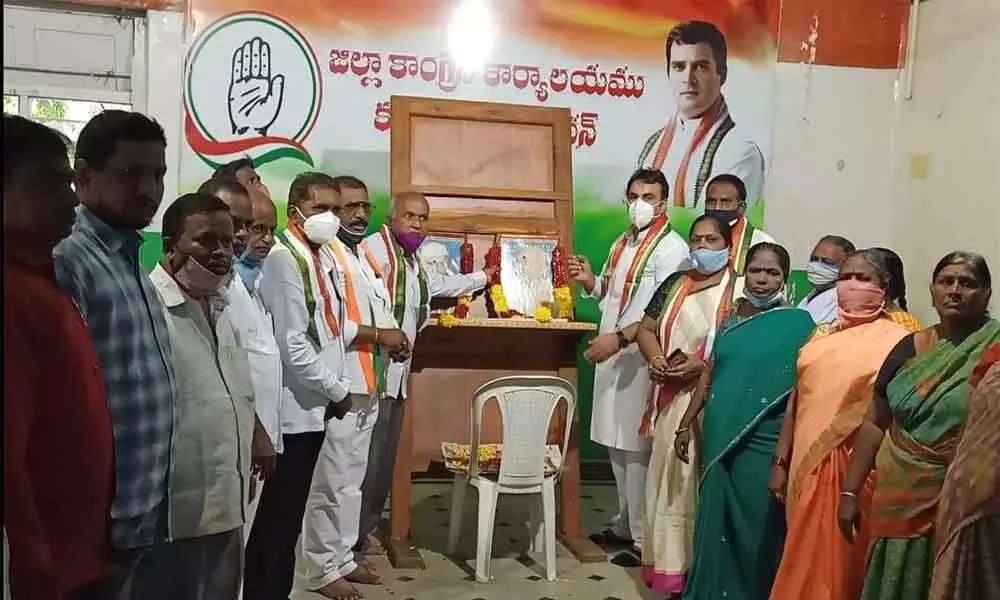 District Congress committee president Mohammed Ali Khan and other members garlanding the portraits of Mahatma Gandhi and Lal Bahadur Shastri to mark their birth anniversaries at Congress party office in Kurnool on Friday.