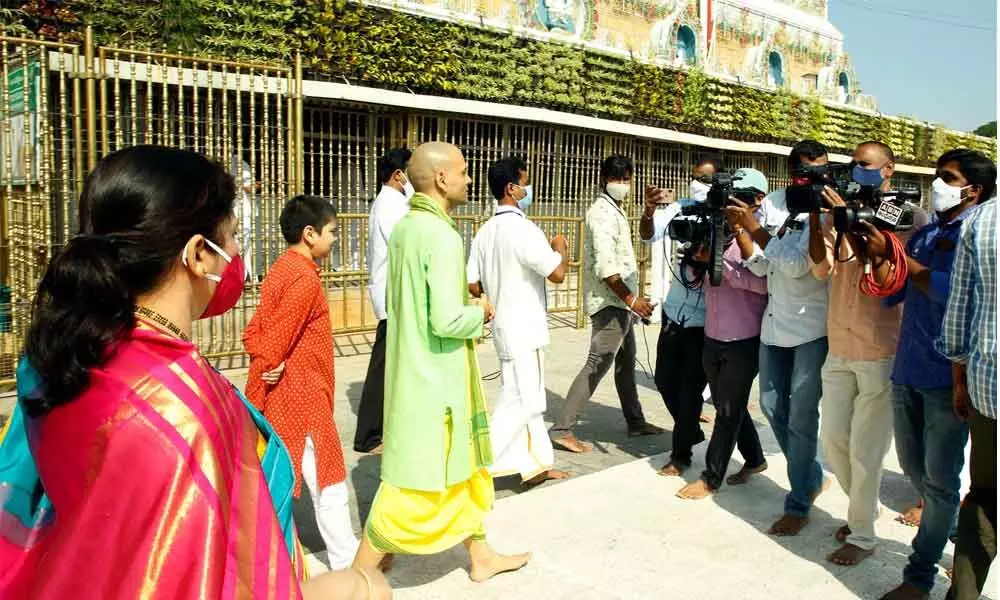 Transferred TTD EO Anil Kumar Singhal leaves Tirumala temple along with his family after being given a farewell by TTD  officials on Friday