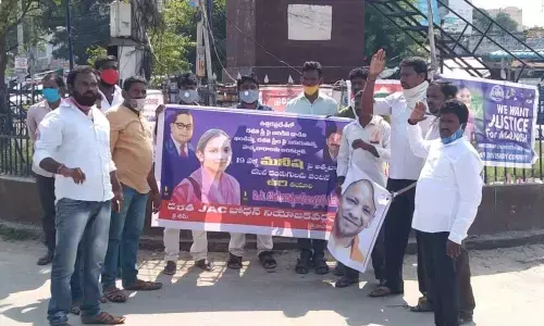 MRPS leaders staging protest against rising atrocities against Dalits in UP in Nizamabad on Friday