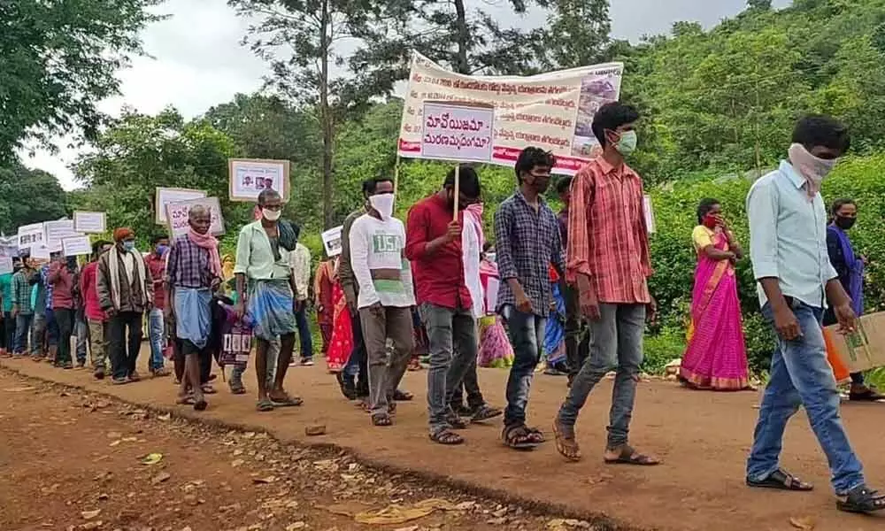 Tribals participating in a rally against the Maoists in Visakhapatnam rural area on Saturday