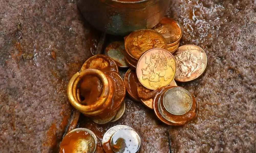 15 gold and 18 silver coins have been found in a copper vessel during the renovation works of the temple at Ghanta Mutt