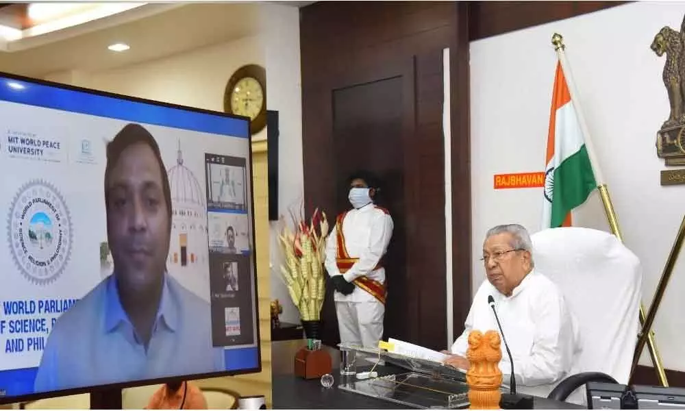 Governor Biswa Bhusan Harichandan addressing the sixth Parliament of World Peace