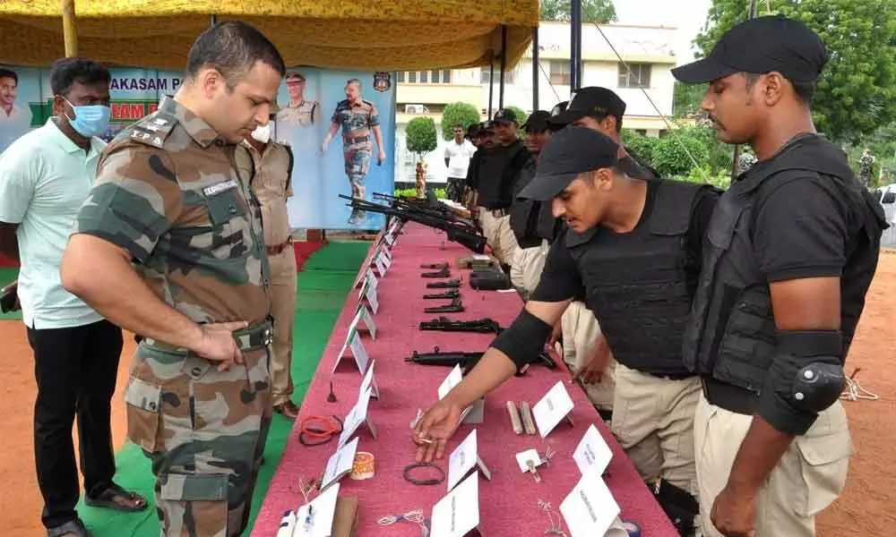 Prakasam SP Siddharth Kaushal testing the knowledge of SWAT team members in Ongole on Sunday