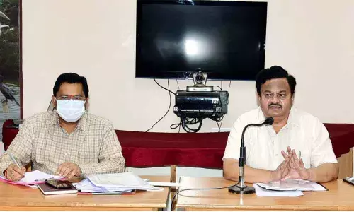 JC K Venkata Ramana Reddy speaking at a review meeting with RDOs and tahsildars in Eluru