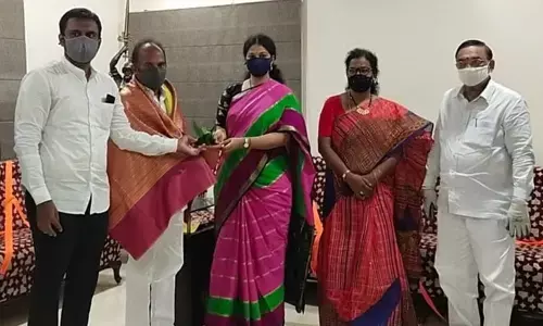 TDP Parliamentary constituency in-charge KS Jawahar meeting MLA Adireddy Bhavani at her residence on Wednesday