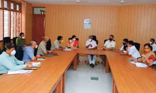 Mysuru district in-charge minister Mr S T Somashekar holding a meeting with officials of Mysuru district administration on Wednesday