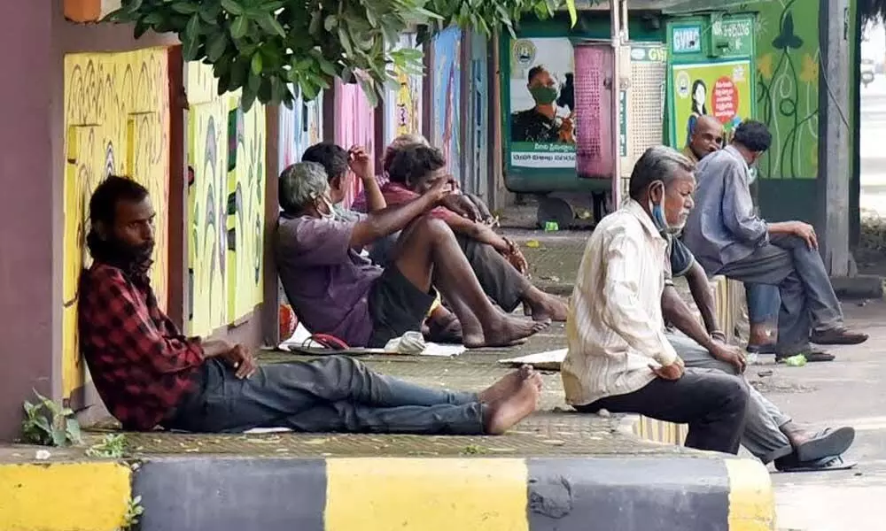 Homeless persons at a footpath in Visakhapatnam 	Photo: A Pydiraju