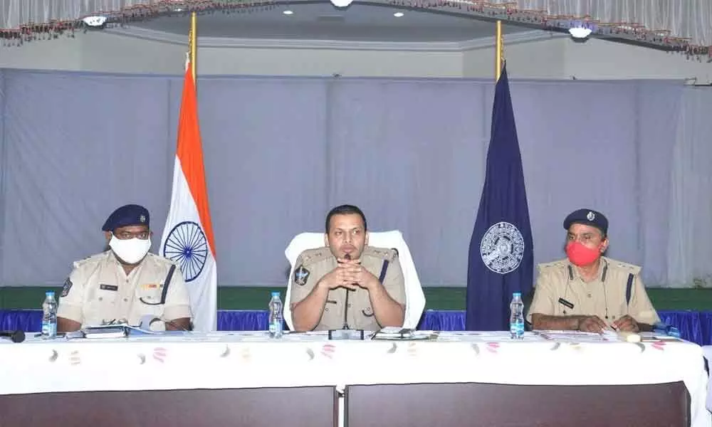 Prakasam SP Siddharth Kaushal holding a review meeting wth police and SEB officials in Ongole on Saturday