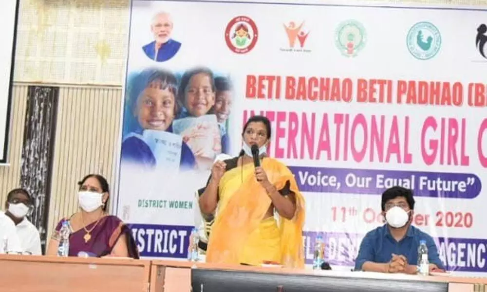 In-charge Collector M Gouthami speaking at a convention after the inauguration of International Girl Child Day