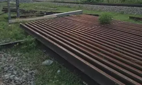 Scrap material lying along the railway track in Waltair Division of East Coast Railway