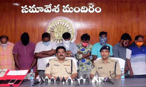 Krishna District Superintendent of Police M Ravindranath Babu producing the cricket betting gang