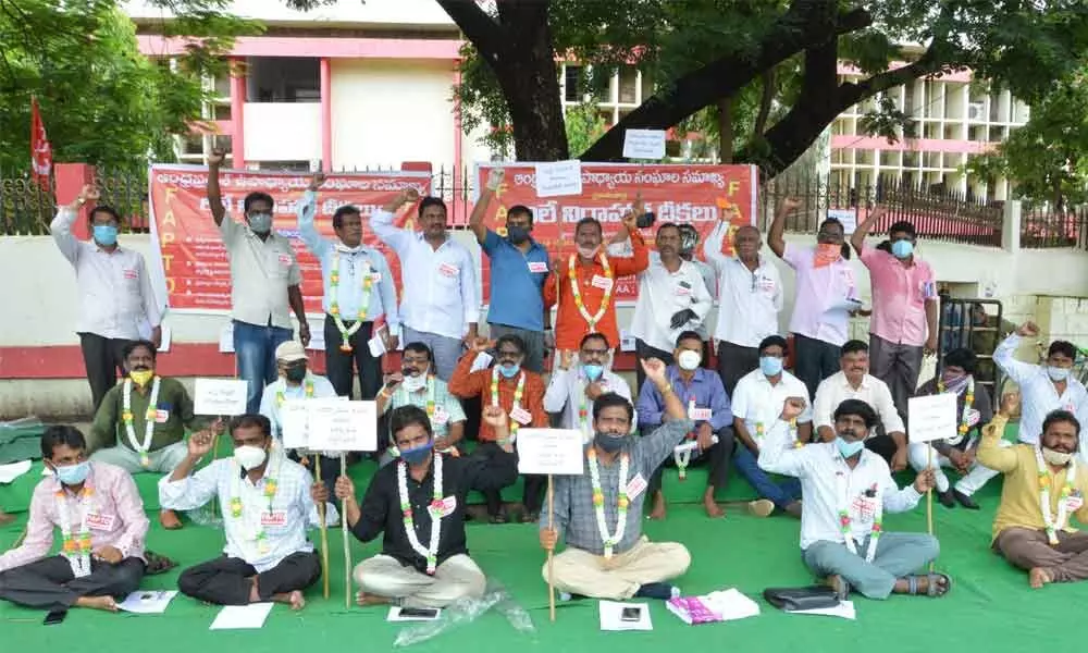 Members of the Prakasam district unit of FAPTO sitting in a relay hunger strike at Collectorate in Ongole on Monday