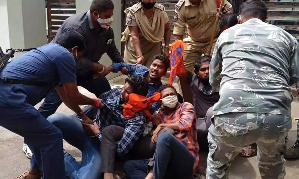 Police caning ABVP workers in  Hanamkonda