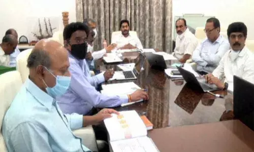 YS Jagan reviews on free electricity scheme, says no burden on farmers, directs officials to create awareness