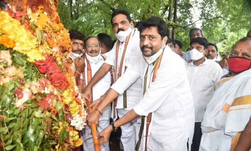 MP B Chandrasekhar and MLA B Appalanarasaiah axing the tree for Sirimanu of Goddess Paidithalli at Balarampuram village of Jami mandal on Monday