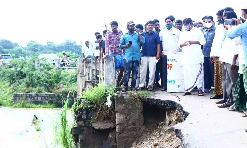 CLP leader Mallu Bhatti Vikramarka observing damaged bridge near Maturi village on Thursday
