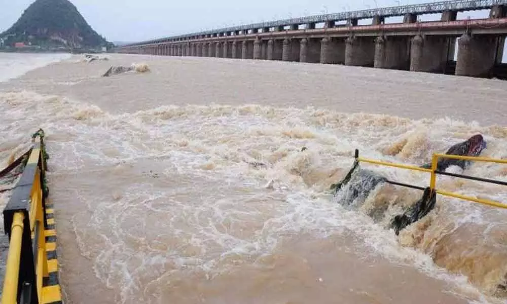 Krishna flood fury continues as floodwater discharged from Prakasam barrage