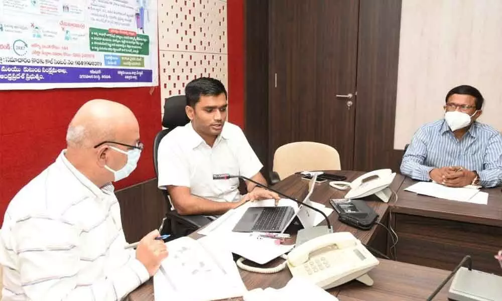 District Collector Dr N Bharath Gupta, State Covid- 19 Advisor Dr Kamalraj and other health officials participating in a review meeting