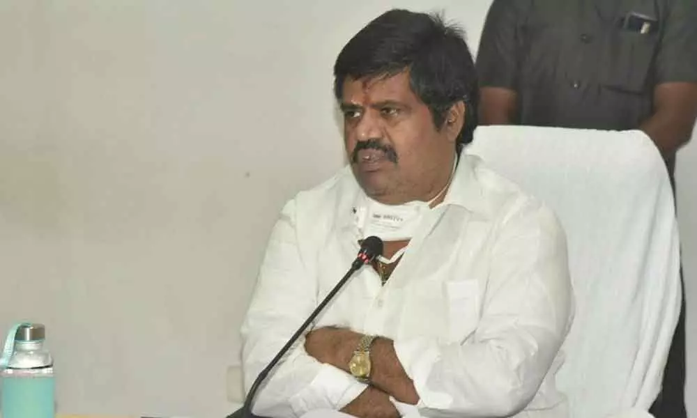 Tourism Minister M Srinivasa Rao at a review meeting held in Visakhapatnam