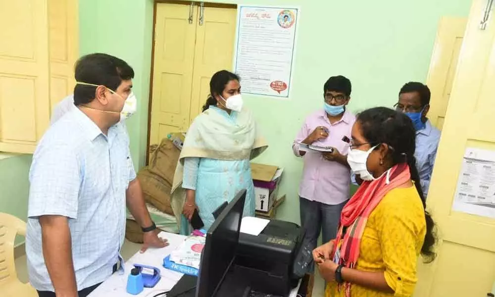 Collector V Vinay Chand interacting with staff at the secretariat at Vempadu in Visakhapatnam district on Saturday