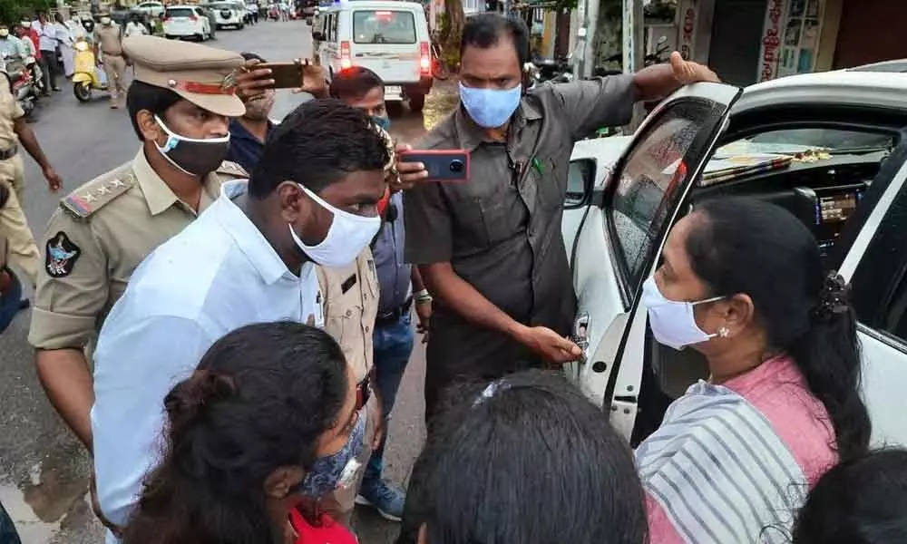 Home Minister M Sucharitha visiting the house of victim Divya Tejaswini in Vijayawada on Saturday