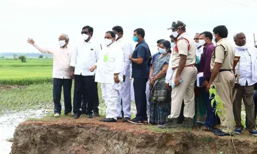 Minister for Transport, Puvvada Ajay Kumar inspecting damaged crop in Sathupalli on Saturday