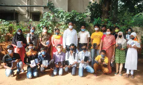 Government school students in Malleswaram constituency get tabs, laptops