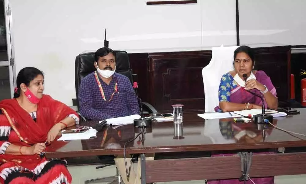 GMC Commissioner Challa Anuradha addressing a meeting with the officials in Guntur on Monday