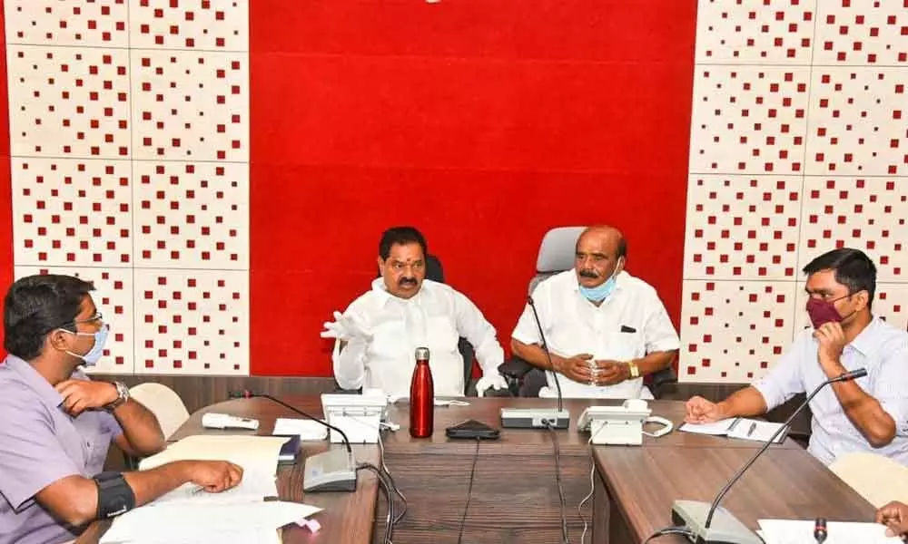 Deputy Chief Minister K Narayanaswamy taking part in a review meeting held at the Collectoate in Chittoor on Monday. MP N Reddappa and District Collector Dr N Bharat Gupta are also seen.